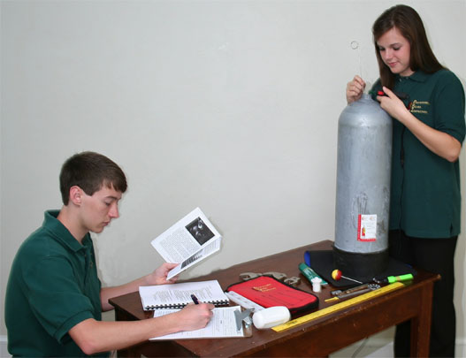 Scuba tank inspection, certification offered to divers during Our World-Underwater Expo